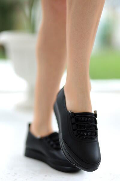 Alva Siyah Cilt Boncuk Detaylı Spor Ayakkabı Alva Siyah Cilt Boncuk Detaylı Spor Ayakkabı